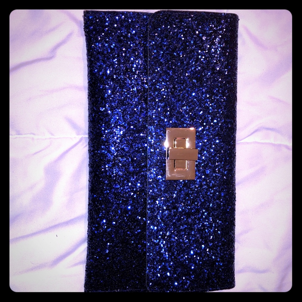 Blue sequin clutch with gold clasp